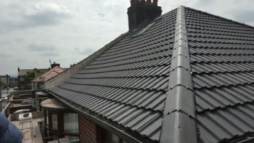 Grey tiles on reroof in Manchester